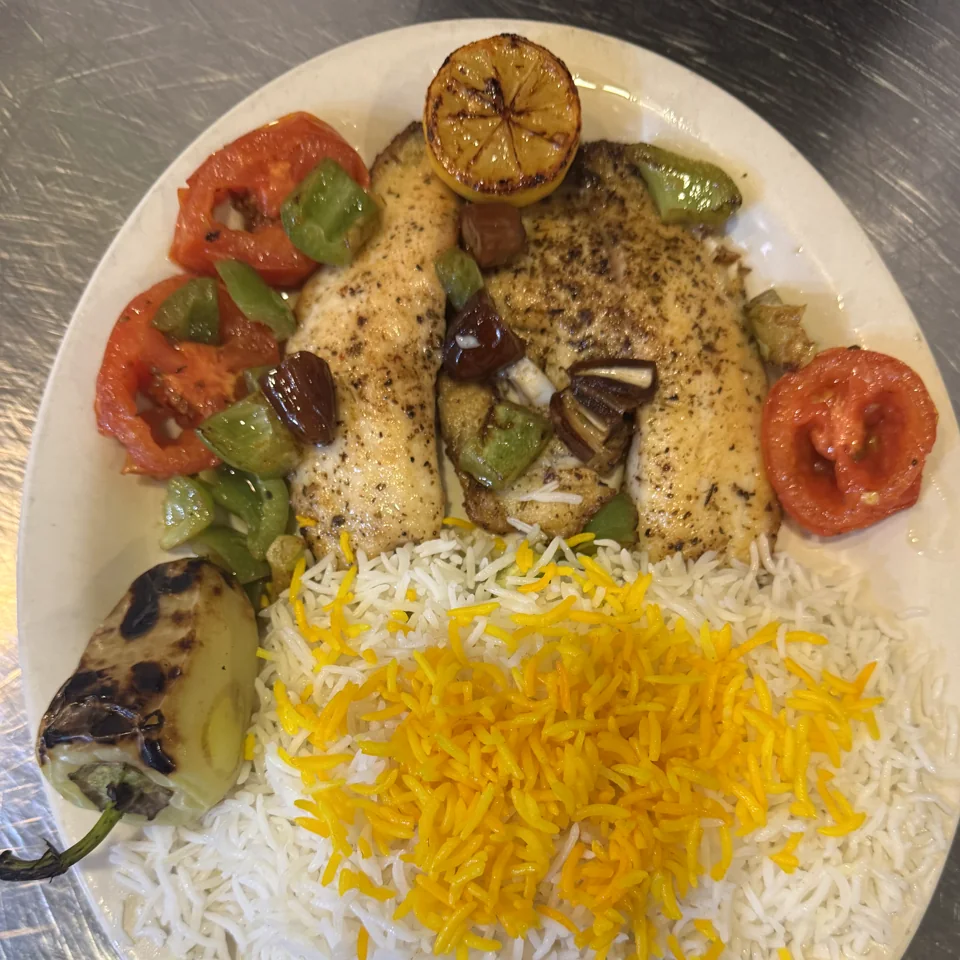 Grilled tilapia with a charred lemon