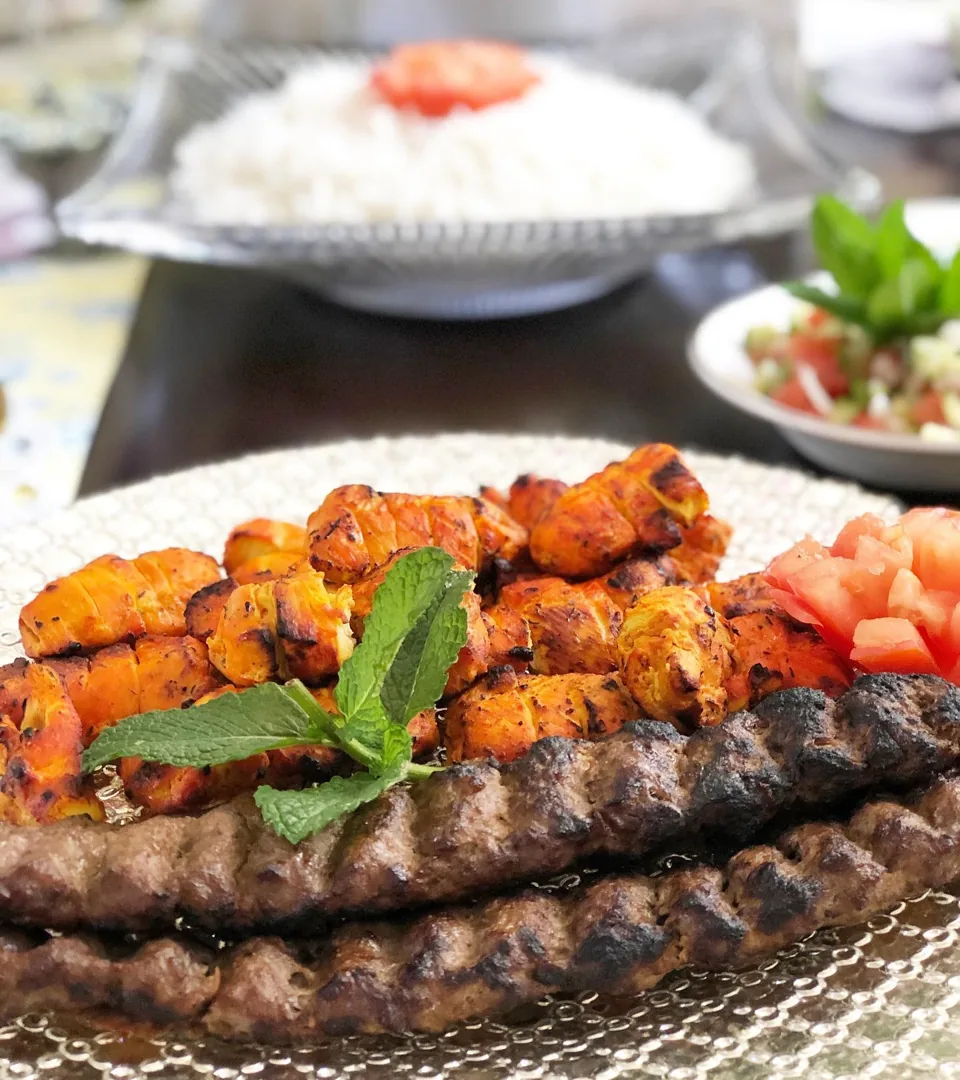 Koobideh and chicken on a platter