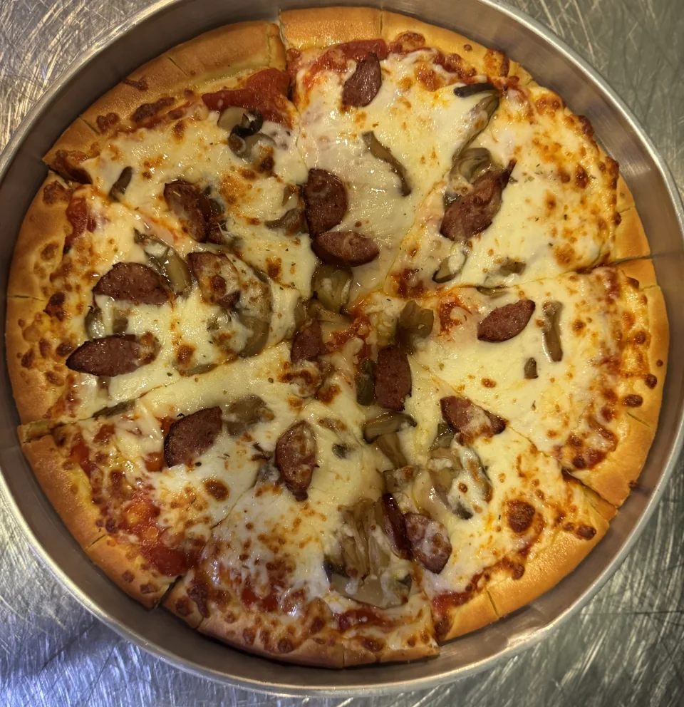 Mushroom and sausage pizza