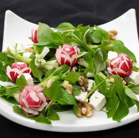 Greens with radish and walnut